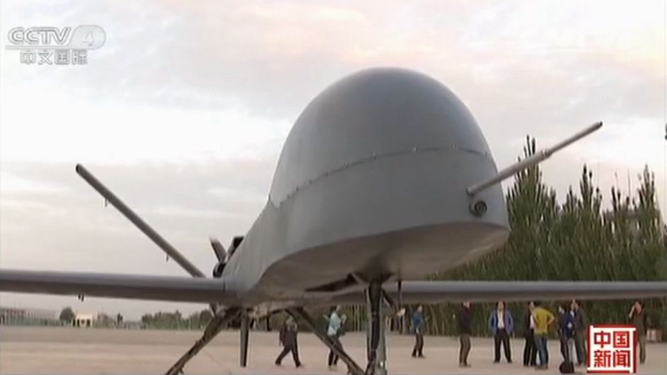 The screen shot from the video of CNTV shows that one of China's biggest UAV (UAV，Unmanned Aerial Vehicle) has completed its maiden flight successfully. (Photo source: CNTV) 
