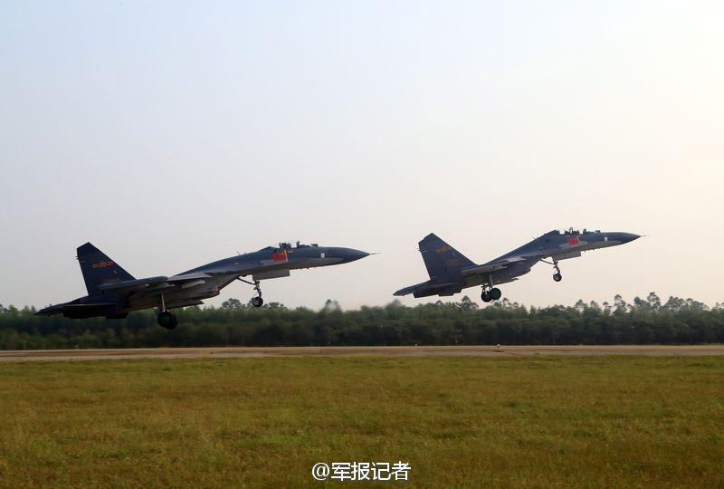 China's air force holds confrontation training: J-11 VS. J-8F