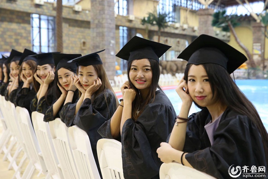 Students take stylish bikini graduations photos