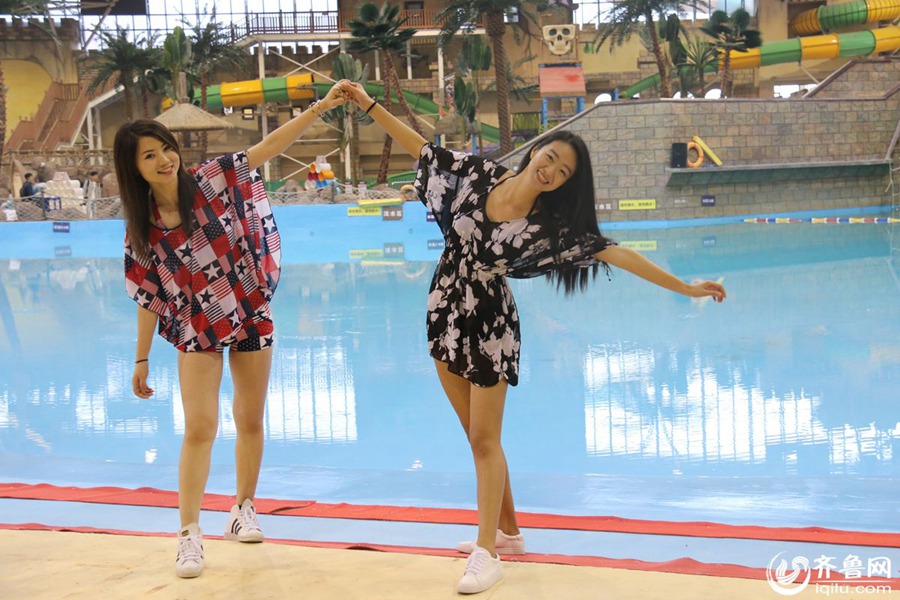 Students take stylish bikini graduations photos