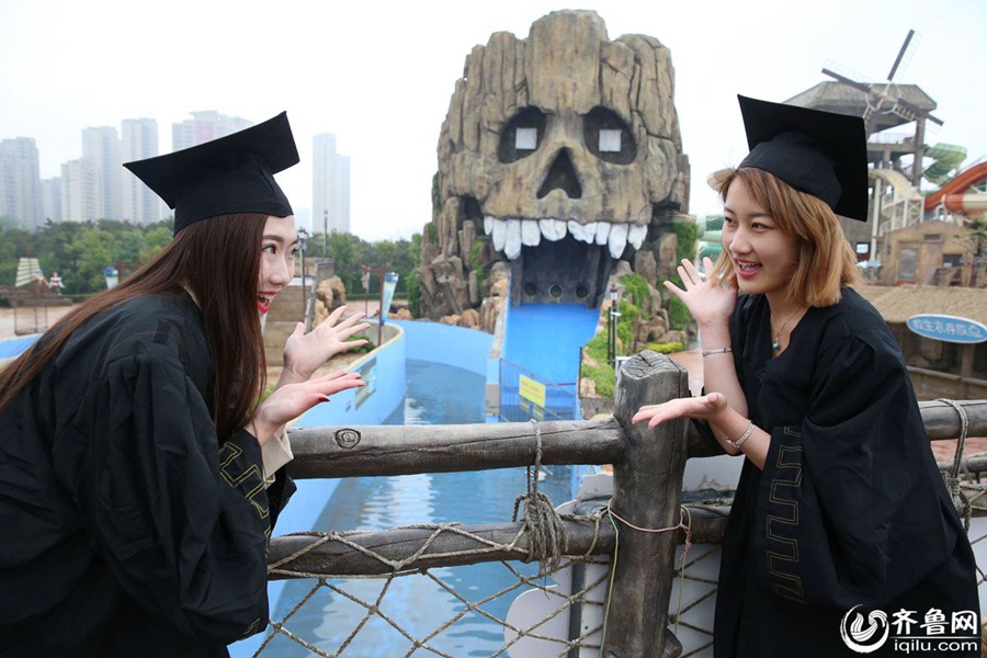 Students take stylish bikini graduations photos