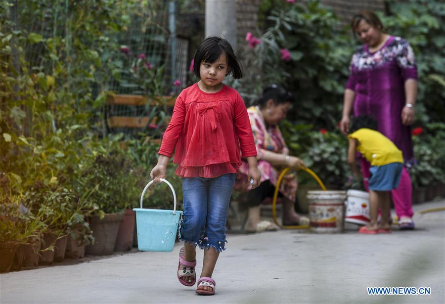 Measures carried out in poverty-stricken villages in China's Xinjiang to improve locals' living standards