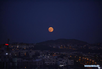 In pics: full moon seen across world