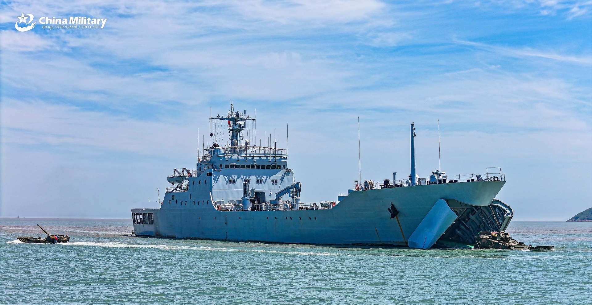 Amphibious armored vehicles board onto landing ship